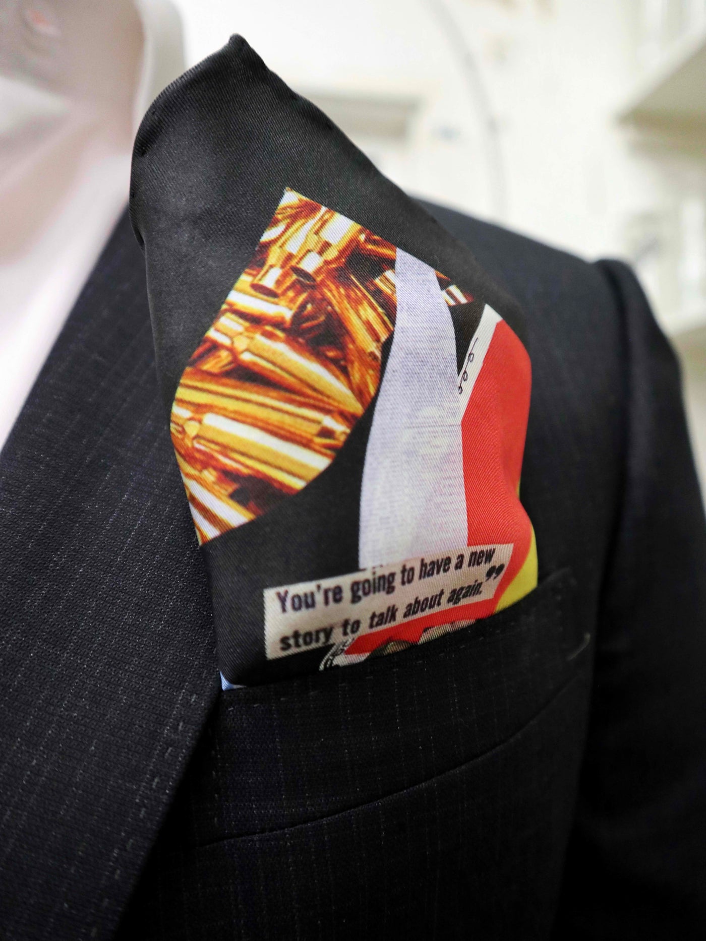 New Beauty silk pocket square styled in a suit pocket, featuring bold design and luxury silk twill texture.