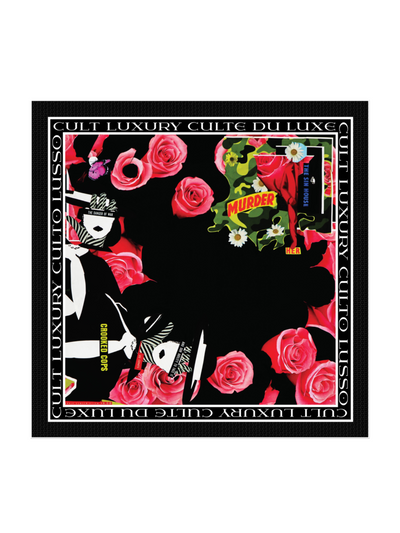 A flat lay of the Pink Roses Shawl from Cult Luxury, featuring vibrant pink florals, black and white silhouettes, and bold typography along the border.