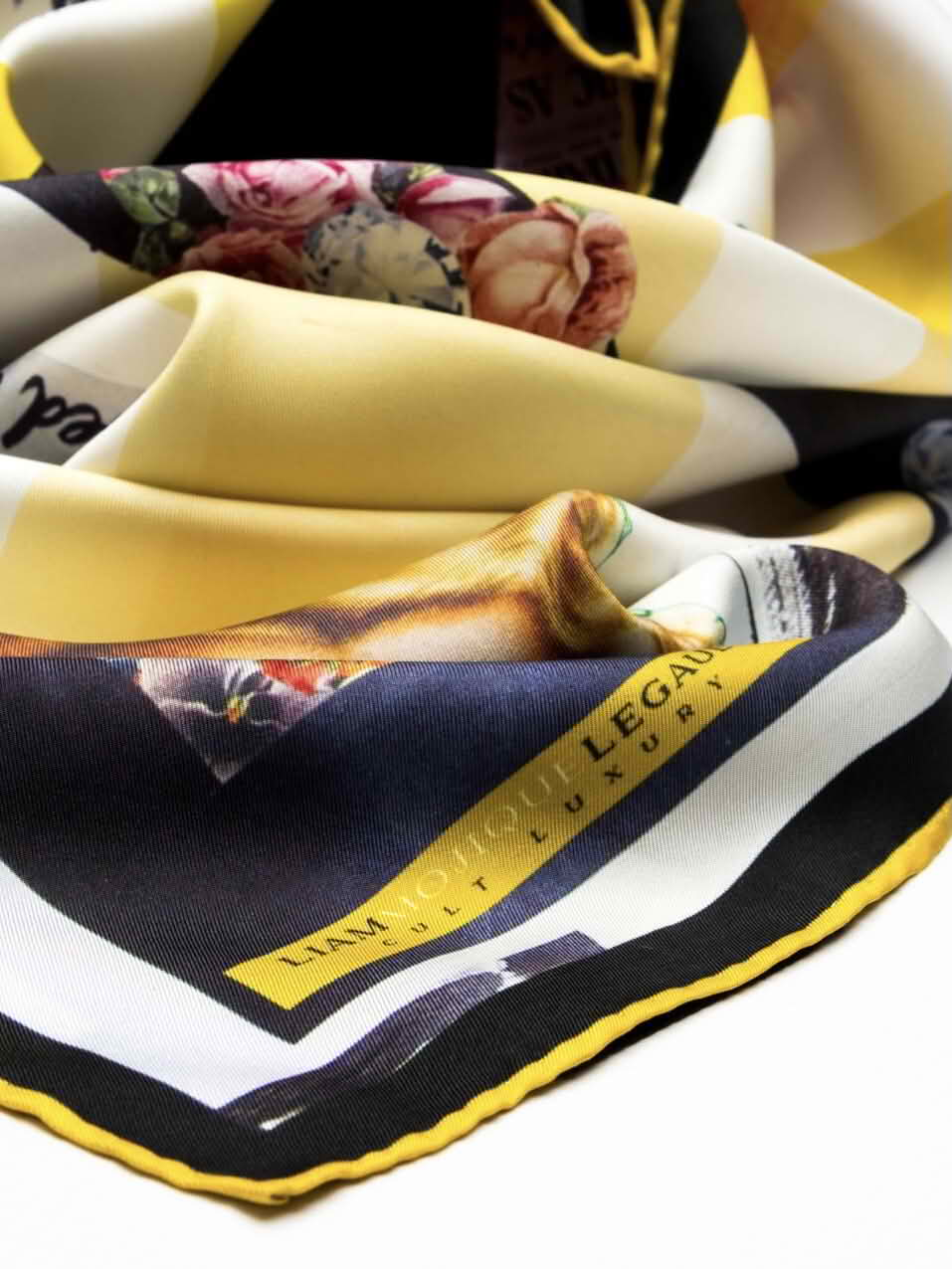 Detailed view of the Beloved Armor silk scarf 65, highlighting its bold yellow stripes, delicate floral collage, and hand-rolled silk edges from Cult Luxury